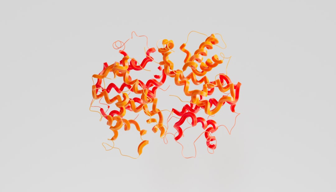 3D representation of a peptide structure with colorful ribbons making up the molecular model.
